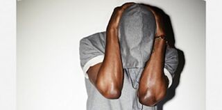 Kanye West in the A.P.C. hoodie (A.P.C. website)