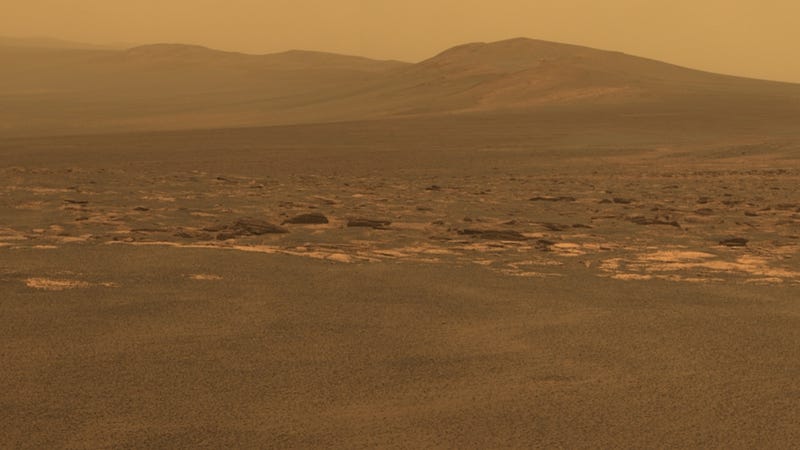 Illustration for article titled What ancient secrets are hidden in this Martian crater?