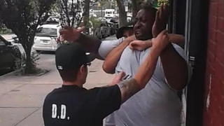 Police officers arrest Eric Garner in Staten Island, N.Y., July 17, 2014.YOUTUBE SCREENSHOT