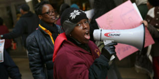 Demonstrators protest school closings outside the Chicago Public Schools offices. (Scott Olson/Getty Images)