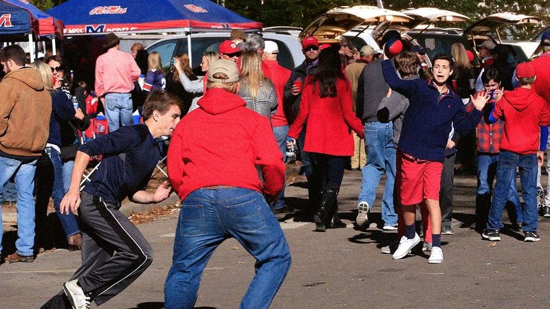 Illustration for article titled Tailgaters Playing Sad Little Game Of Pickup Football In Stadium Parking Lot