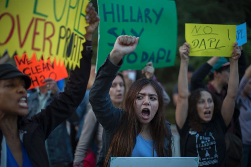 Activists demonstrate near a Hillary Clinton presidential-campaign fundraiser with President Barack Obama to call for a halt to the Dakota Access Pipeline project Oct. 24, 2016, in Beverly Hills, Calif. DAVID MCNEW/AFP/Getty Images