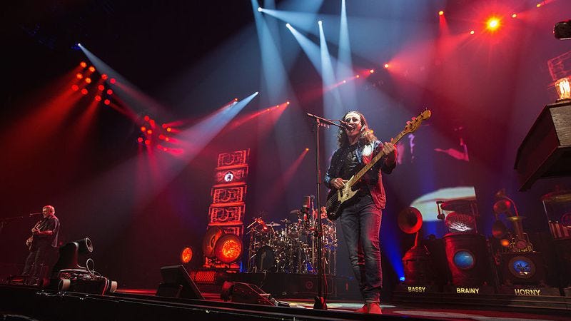 Alex Lifeson, Neil Peart, and Geddy Lee of Rush perform on stage during the R40 LIVE Tour at KeyArena on July 19, 2015 in Seattle, Washington. (Photo: Mat Hayward/Getty Images)