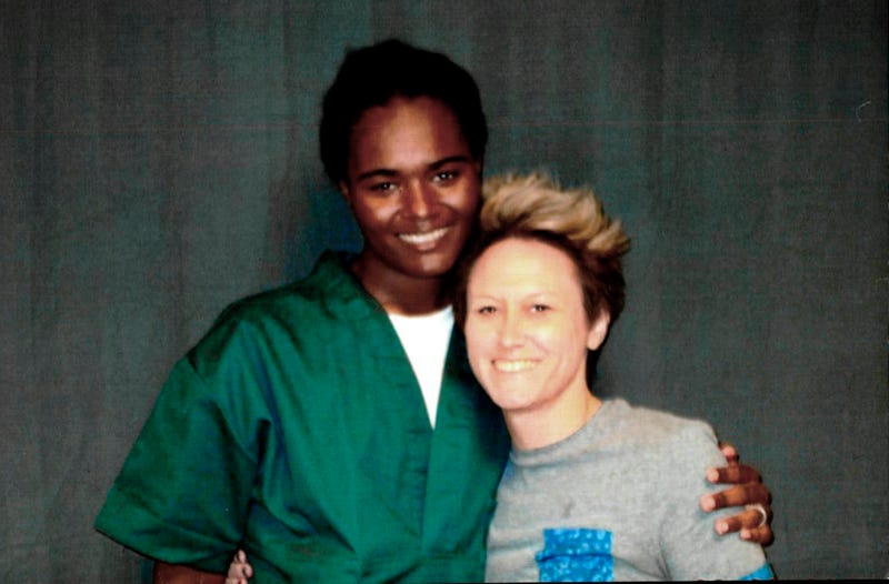 This 2018 photo provided by inmate Lindsay Saunders-Velez shows her, at left, with mentor Meghan Baker at the Colorado Territorial Correctional Facility in Cañon City, Colo.
