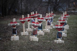 Forty-three crosses sit in a vacant lot in the Englewood neighborhood of Chicago on Jan. 23, 2017. Each cross, created by Greg Zanis, represents a victim of murder in Chicago in 2017. (Scott Olson/Getty Images)