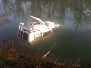 Illustration for article titled News Van Takes Dip In The River