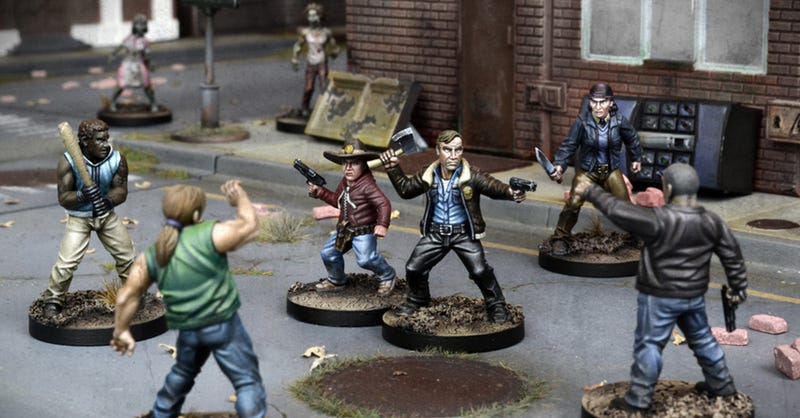 Illustration for article titled Roll Dice to Smash In Zombie Heads With the Walking Dead Tabletop Miniatures Game