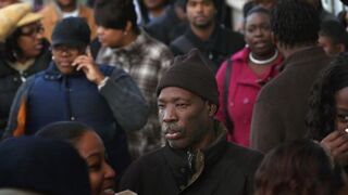 Job seekers wait in line at Kennedy-King College in Chicago on Nov. 9, 2012, to attend a job fair hosted by the city.  Scott Olson/Getty Images