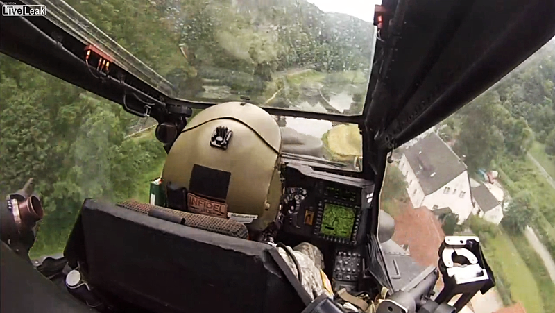 Illustration for article titled Watch This AH-64 Apache Crew Charge Around Below The Treetops In The German Countryside