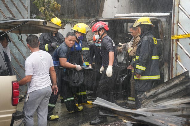 Rain and a wrong address delayed firefighters reaching a Philippine factory blaze. 15 people died