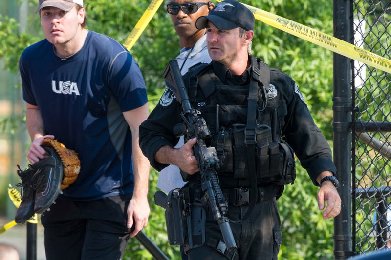 A member of the congressional Republican baseball team is allowed to leave the scene of a multiple shooting involving House Majority Whip Steve Scalise of Louisiana on June 14, 2017, in Alexandria, Va. (Cliff Owen/AP Images)