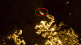 Illustration for article titled A Mysterious "Magic Island" Has Appeared On Titan
