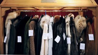 Fancy furs and vintage couture seduce buyers at a Paris auction Oct. 27, 2008.  LIONEL BONAVENTURE/AFP/Getty Images