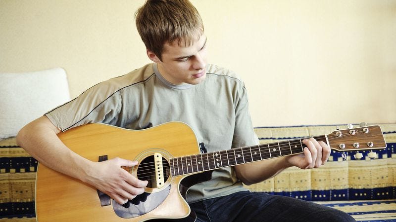 Illustration for article titled Area Man Having One Of His Little Bursts Of Energy Where He Tries To Write A Song
