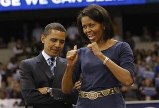 Sir, what are you looking at? A playful moment between the Obamas.AFP/Getty Images