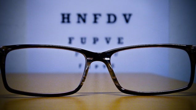 Picture of glasses against an eye exam chart
