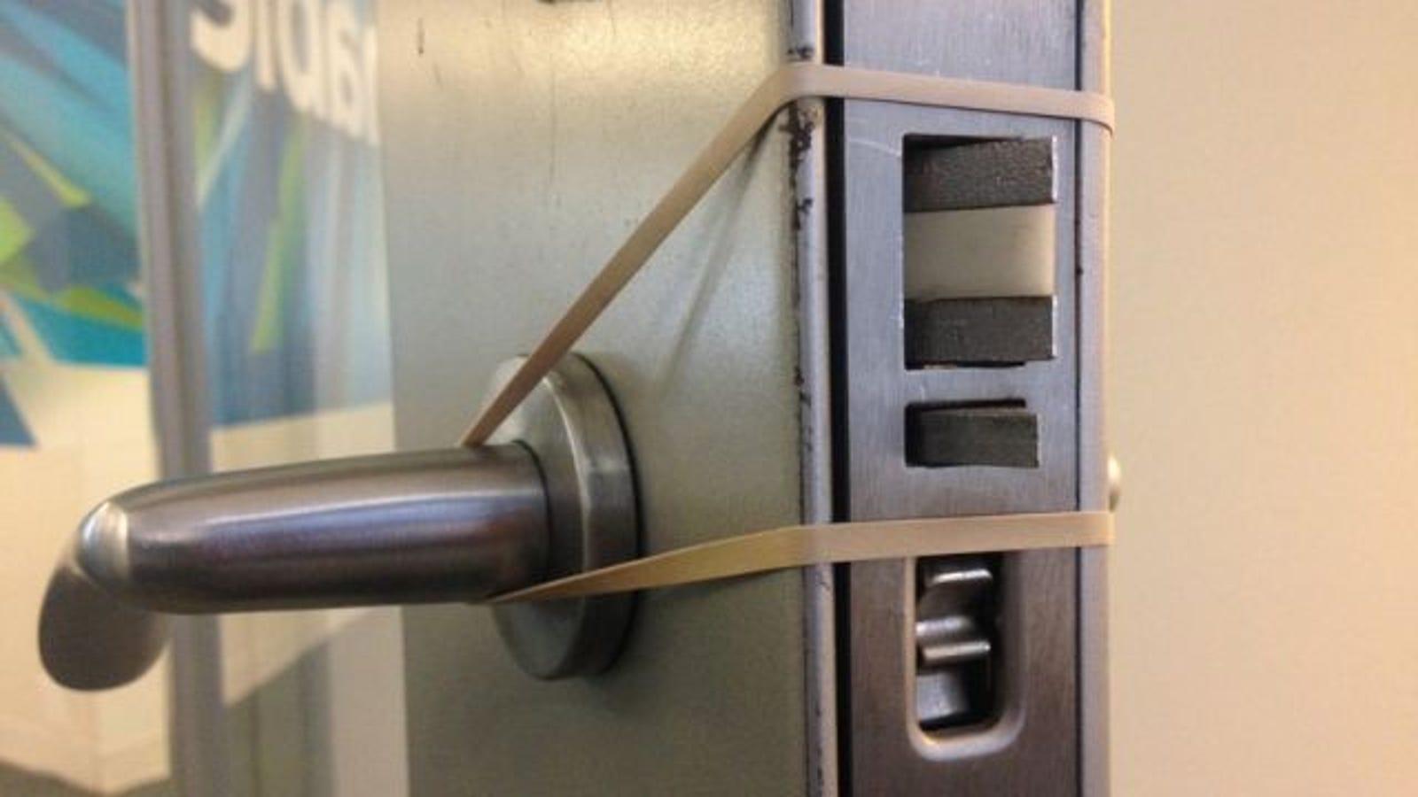 Add A Rubber Band To Door Knobs To Soften Slamming Doors