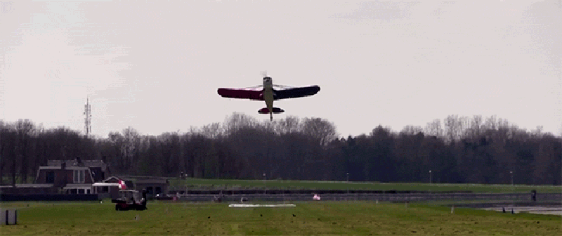 This Is How An Airplane Picks Up A Banner While Flying In The Air This Is How An Airplane Picks Up A Banner While Flying In The Air