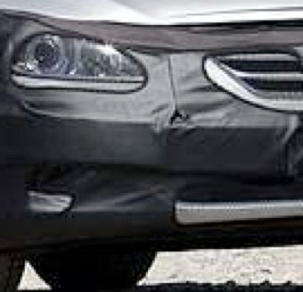 Illustration for article titled 2011 Hyundai Genesis Shows A New Mr. Ed-Like Grille