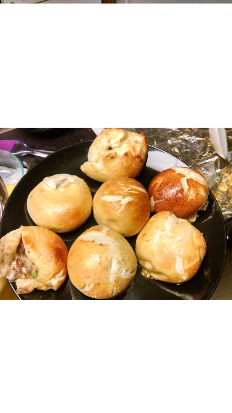 Illustration for article titled Cheesesteak Stuffed Pretzel Rolls