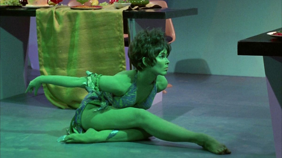 Sexy green girl on star trek landing