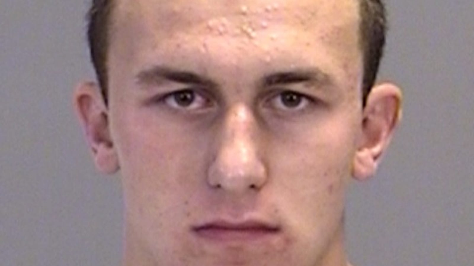 This Is How The World Wound Up With That Famous Shirtless Mug Shot Of