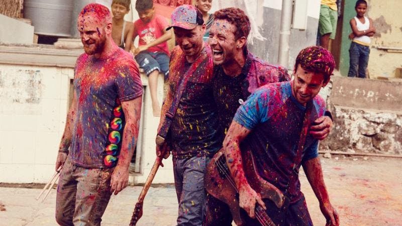 Coldplay, once more drenched in the blood of favela children (Credit: Julia Kennedy)