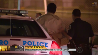 An officer escorts an inmate of a Nashville, Tenn., detention center who was recaptured after he and other teens escaped the night of Sept. 1, 2014. CBS This Morning Screenshot