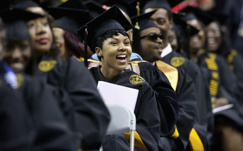 Graduates cheer as first lady Michelle Obama delivers the commencement speech during the Bowie State University graduation ceremony at the Comcast Center on the campus of the University of Maryland on May 17, 2013, in College Park, Md.Chip Somodevilla/Getty Images