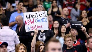 Los Angeles Clippers fan holds up sign demanding new ownership for the team before the April 29, 2014, game with the Golden State Warriors in Game 5 of the Western Conference Quarterfinals.Stephen Dunn/Getty Images