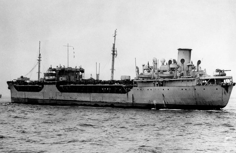 A Liberty ship loaded with trucks leaves a U.S. east coast port on April 10,1944.