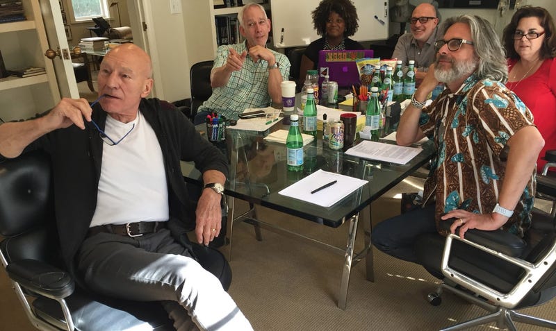 Illustration for article titled Ward off the encroaching darkness with a photo of Patrick Stewart and his new Star Trek writers