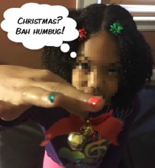 Red and green accessories are the closest Emmy, the writer’s daughter, gets to Christmas.Photo illustration by Aliya S. King
