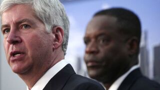 Michigan Gov. Rick Snyder (l), and Kevyn Orr (r), Detroit's emergency manager (Bill Pugliano/Getty Images)
