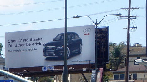 Audi Trolls Tesla With Billboard For Upcoming Musk Have