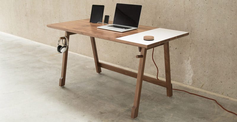 Illustration for article titled This Desk Keeps Your Cords In Order and Has a Built-In Whiteboard