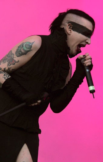 Illustration for article titled Marilyn Manson Has H1N1, Tries To Infect Audience; Hef Wants Megan Fox In Playboy