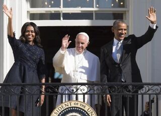 President Barack Obama, first lady Michelle Obama and Pope Francis wave during an arrival ceremony for the pope on the South Lawn of the White House in Washington, D.C., Sept. 23, 2015. More than 15,000 people packed the South Lawn for a full ceremonial welcome of Pope Francis for his first visit to the United States.JIM WATSON/AFP/Getty Images