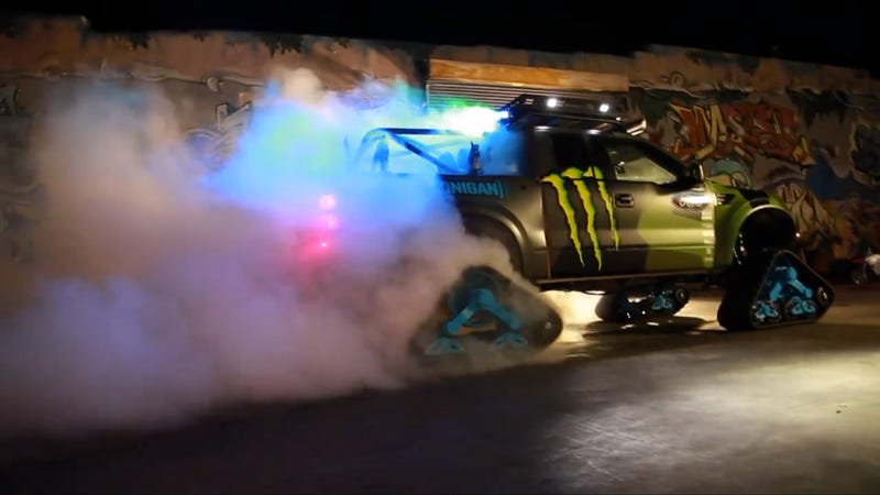 Illustration for article titled Ken Block Kills All The Rubber In This RaptorTRAX Four-Tread Burnout
