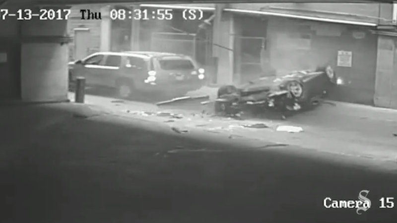 BMW plunges 7 stories from Texas parking garage; crashes into alley