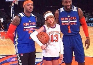 Illustration for article titled Oh Nothing, Just Taylor Swift Hanging Out With Her Pals From The Knicks