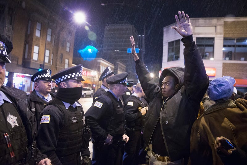 Demonstrators confront police during a protest over the death of Laquan McDonald on Nov. 25, 2015, in Chicago. (Scott Olson/Getty Images)