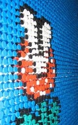 Illustration for article titled Gamer Turns 17K Push Pins Into Mosaic Art