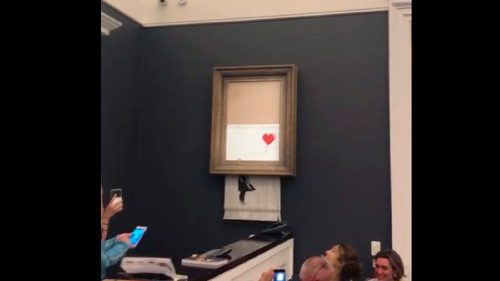 banksy painting shred video