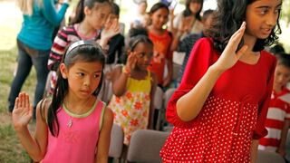 Children at a Virginia citizenship ceremony - Getty Images