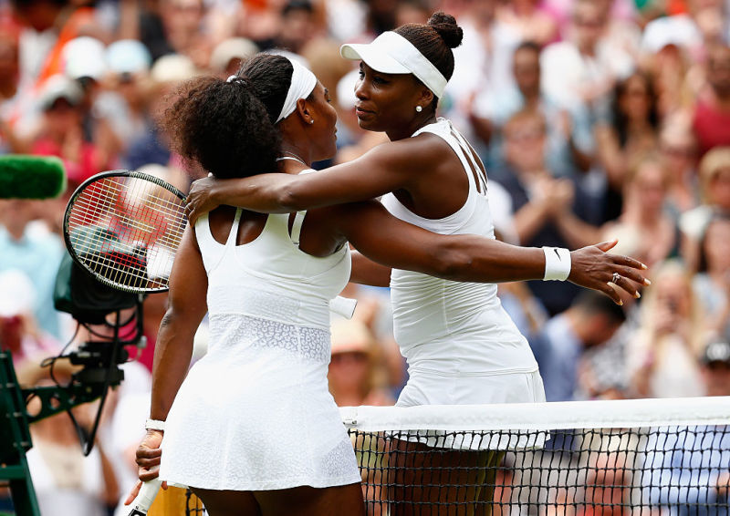 Serena Williams hugs sister Venus Williams after their ladies’ singles fourth-round match at the Wimbledon Lawn Tennis Championships on  July 6, 2015, in London.Julian Finney/Getty Images