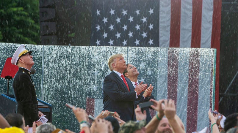 Illustration for article titled Planes, Tanks, & Space Force: Scenes From Trump's Soggy Fourth of July Extravaganza