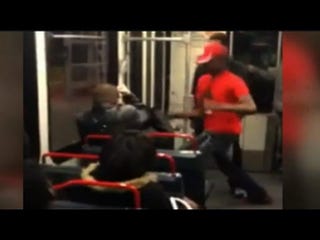 A St. Louis train rider is attacked over his response to a question about the shooting death of Michael Brown in Ferguson, Mo., last August.YouTube Screenshot