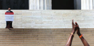 Rep. John Lewis speaking at the 50th anniversary of the March on Washington (Getty Images)