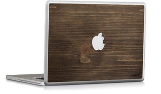 Illustration for article titled A Woodie MacBook Skin Really Classes Up the Joint